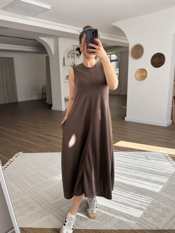 SIFIR KOL DİKİŞ DETAY CEPLİ UZUN ELBİSE